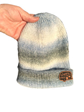 Load image into Gallery viewer, Blue, White, and Grey Ombre Knit Beanie W/ Leather Patch
